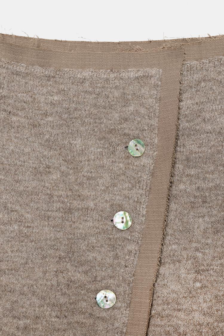 Chaqueta punto cuello barco